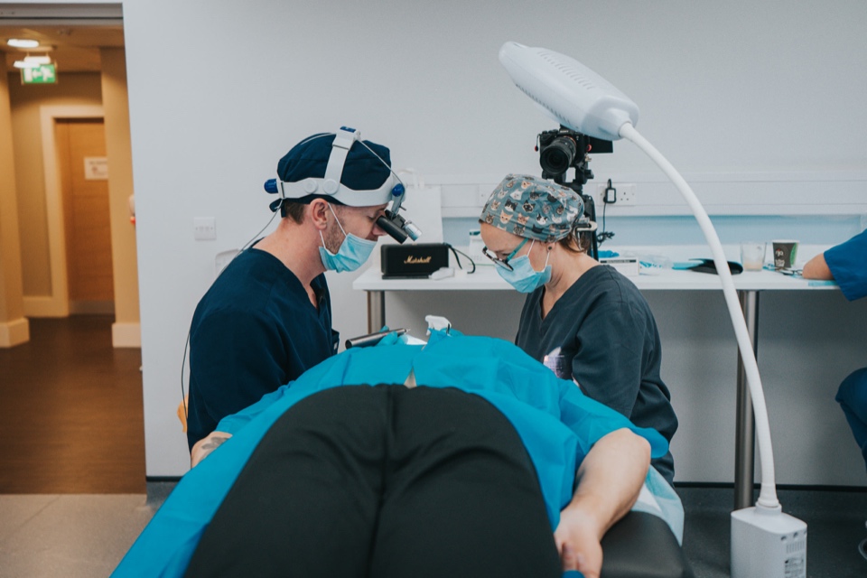 Dr Jamie Harrison and the clinic team performing a hair transplant